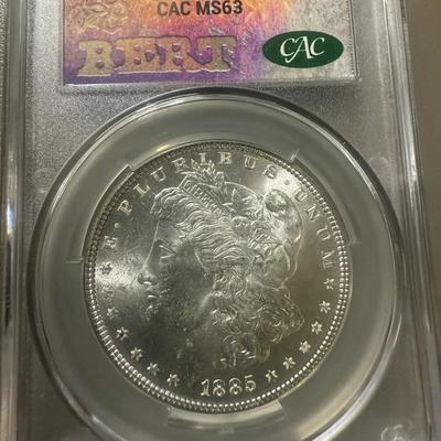1885 CAC MS 63 Morgan Dollar (Toning)