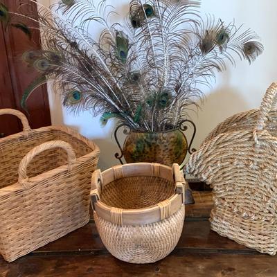 Three Baskets, Metal Vase And Peacock Feathers