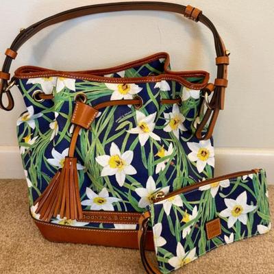 Dooney & Bourke Daffodil drawstring bag with a matching wristlet. 