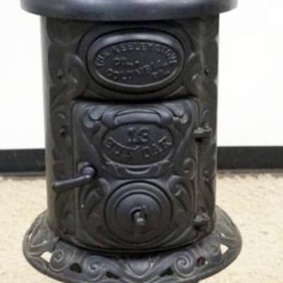 1233	THE KEELY STOVE CO. CAST IRON STOVE, APPROXIMATELY 16 IN X 47 IN H
