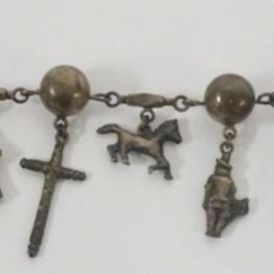 1106	STERLING SILVER CHARM BRACELET, 1.04 OZT
