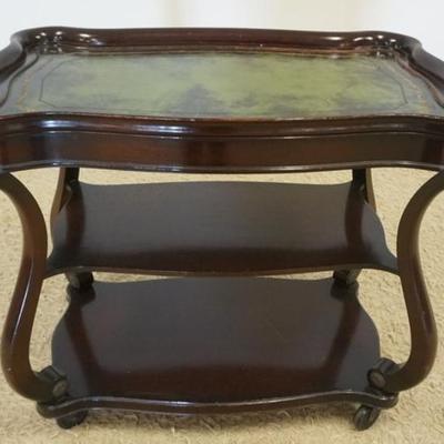 1241	MAHOGANY ROLLING SERVING CART WITH SCROLLED LEG SIDES AND TOOLED LEATHER TOP, APPROXIMATELY 36 IN X 22 IN X 32 IN H
