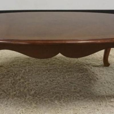 1218	OVAL COFFEE TABLE, APPROXIMATELY 52 IN X 31 IN X 17 IN H
