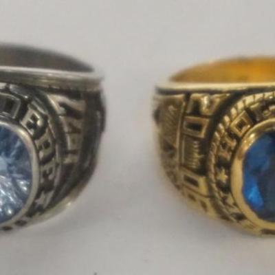 1115	2 HIGH SCHOOL CLASS RINGS, 1 REED AND 1 ULTRIUM, BOTH APPROXIMATE SIZE 7

