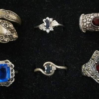 1109	6 LADIES STERLING SILVER RINGS, .89 OZT INCLUDING STONES
