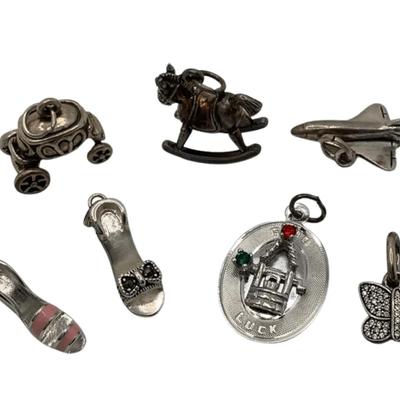 Seven Sterling Silver Charms