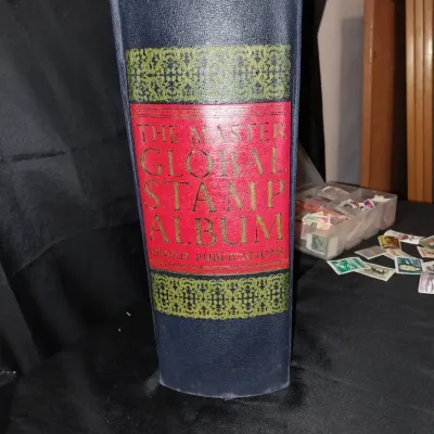 Sale Photo Thumbnail #119: HUGE ALBUM WITH MANY PAGES FILLED WITH STAMPS, MANY NOT. CONTAINER PACKED WITH STAMPS TO BE PUT INTO ALBUM A MUST HAVE FOR BEGINNERS AND LONG TIME COLLECTORS