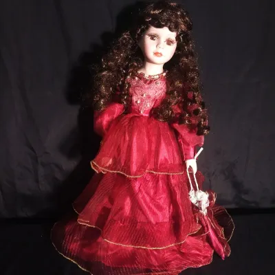 Sale Photo Thumbnail #446: APPROX. 17" TALL IN RED GOWN AND PARRASALE