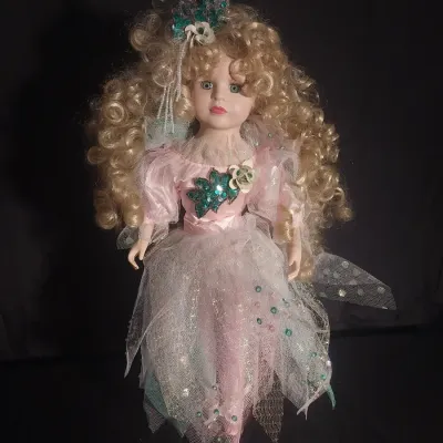 Sale Photo Thumbnail #438: APPROX.17" TALL, SEQUIN/GLITTER BODICE WITH LAYERED TUTU.