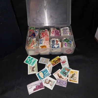 Sale Photo Thumbnail #120: HUGE ALBUM WITH MANY PAGES FILLED WITH STAMPS, MANY NOT. CONTAINER PACKED WITH STAMPS TO BE PUT INTO ALBUM A MUST HAVE FOR BEGINNERS AND LONG TIME COLLECTORS