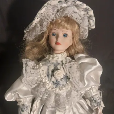 Sale Photo Thumbnail #436: MEASURES APPROX. 17" TALL IN WHITE SATIN GOWN WITHJ MATCHING BONNET AND PARASOL
