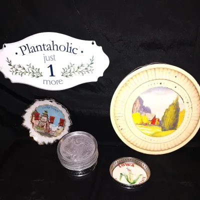 Sale Photo Thumbnail #289: VINTAGE TOURING PLAYIMG CARDS-HANGING SIGNAGE-SMALL COLLECTOR PLATE-CHALKWARE BOOKENDS