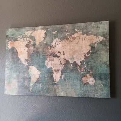 LIGHTED GLOBE ON A STAND, WORLD MAP ON CANVAS AND A SIDE TABLE