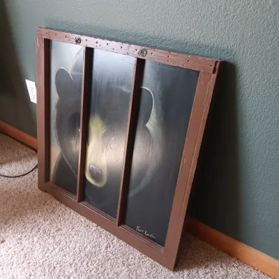 OLD REPURPOSED WINDOW WITH BEAR PAINTING, RUSTIC STOOL AND SHARPES ON DVD