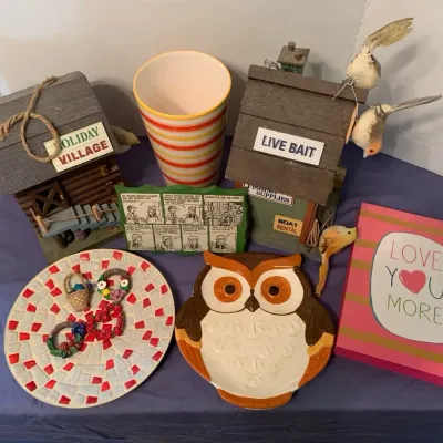 Miscellaneous Plates, Decorative Birdhouses, Signs, And A Vase