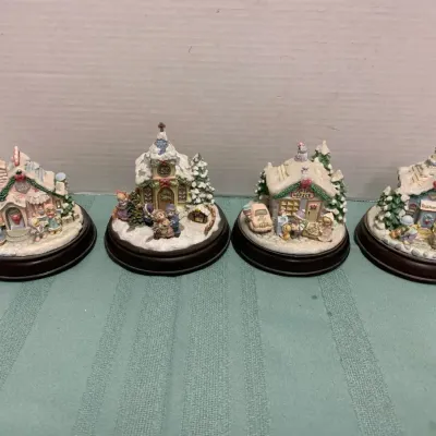 Four Precious Moments Figurines