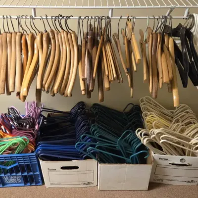 Large Lot of Wooden & Plastic Hangers