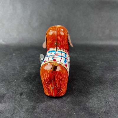 130 | VINTAGE | Tin Dog with Red Boot Boot | Yanoman