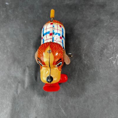 130 | VINTAGE | Tin Dog with Red Boot Boot | Yanoman