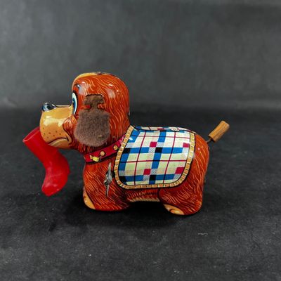 130 | VINTAGE | Tin Dog with Red Boot Boot | Yanoman