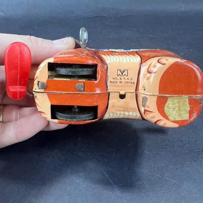 130 | VINTAGE | Tin Dog with Red Boot Boot | Yanoman