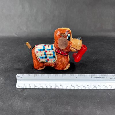 130 | VINTAGE | Tin Dog with Red Boot Boot | Yanoman