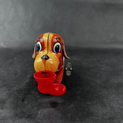 130 | VINTAGE | Tin Dog with Red Boot Boot | Yanoman