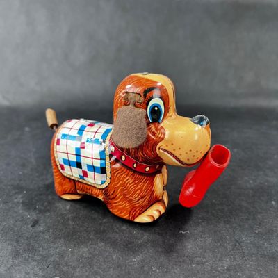 130 | VINTAGE | Tin Dog with Red Boot Boot | Yanoman
