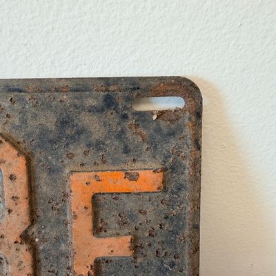 Sale Photo Thumbnail #49: Matching pair of vintage 1956 New Jersey metal license plates, registration number ZA 23F. Each plate features embossed orange characters on a dark background with an attached metal '56' tab (stamped 1665727). Both plates show significant age, surface rus