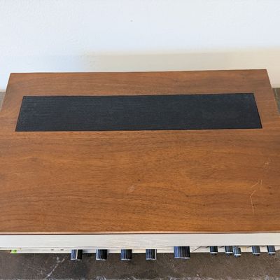 Sale Photo Thumbnail #8: Vintage JVC Model 5020 FM/AM stereo receiver featuring a built-in S.E.A. equalizer control system. Encased in a wood cabinet with a black front panel, illuminated green tuner display, and brushed metal accent trim. Manufactured by Victor Co. of Japan, Ltd