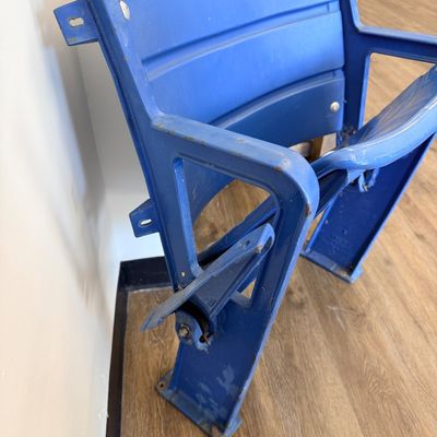 Sale Photo Thumbnail #33: Original blue stadium seat #4 from Veterans Stadium, former home of the Philadelphia Phillies and Eagles. Features molded plastic seat and back with heavy-duty metal frame/supports and metal seat number plate. Includes Certificate of Authenticity signed b
