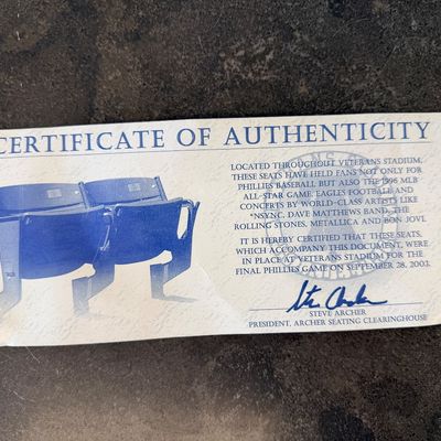 Sale Photo Thumbnail #37: Original blue stadium seat #4 from Veterans Stadium, former home of the Philadelphia Phillies and Eagles. Features molded plastic seat and back with heavy-duty metal frame/supports and metal seat number plate. Includes Certificate of Authenticity signed b
