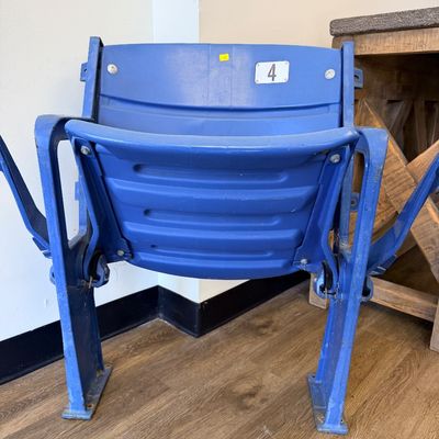 Sale Photo Thumbnail #35: Original blue stadium seat #4 from Veterans Stadium, former home of the Philadelphia Phillies and Eagles. Features molded plastic seat and back with heavy-duty metal frame/supports and metal seat number plate. Includes Certificate of Authenticity signed b