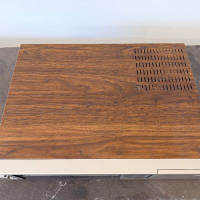 Sale Photo Thumbnail #20: Vintage Zenith 4-Head VHS HQ video cassette recorder (VCR), model VR 1825. Features a simulated wood grain cabinet, front drop-down control panel with timer programming instructions, RCA video/audio inputs and outputs, and coaxial antenna connections. Ser