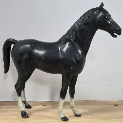 Vintage Louis Marx Johnny West Thunderbolt horse figurine in black.