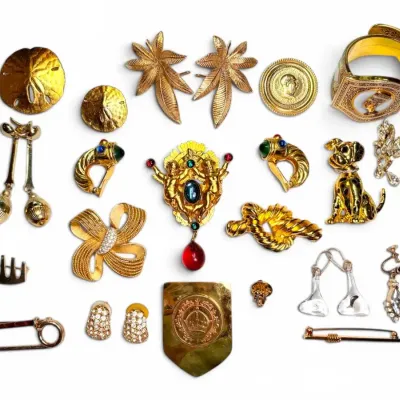 Gold Toned Earrings, Brooches, And More- Including Trifari, Monet, Coro, And Spingarn