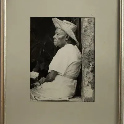 “One Woman” Black & White Photograph by D. Aeluob – Seated Portrait