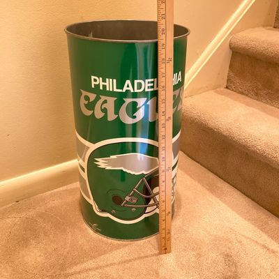 LOT 67: Philadelphia Sports Memorabilia - Vintage Eagles Construction Helmet, Metal Trash Can, Pair of Drinking Glasses, Flyers Plush and...