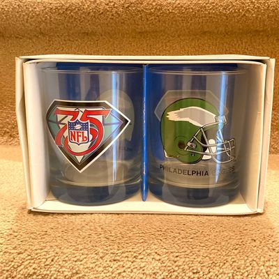 LOT 67: Philadelphia Sports Memorabilia - Vintage Eagles Construction Helmet, Metal Trash Can, Pair of Drinking Glasses, Flyers Plush and...