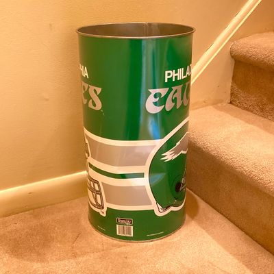 LOT 67: Philadelphia Sports Memorabilia - Vintage Eagles Construction Helmet, Metal Trash Can, Pair of Drinking Glasses, Flyers Plush and...