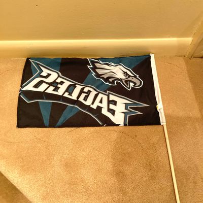 LOT 67: Philadelphia Sports Memorabilia - Vintage Eagles Construction Helmet, Metal Trash Can, Pair of Drinking Glasses, Flyers Plush and...