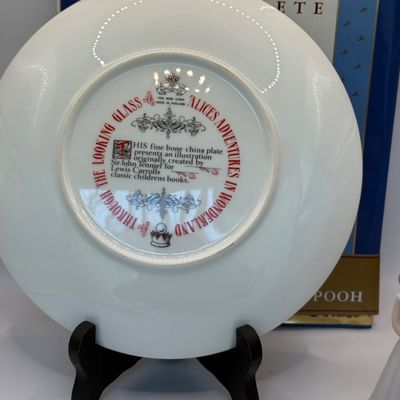 LOT 53: Humpty Dumpty Collectors Plate Enesco Growing Up Birth Girls, and 75th Anniversary Winnie The Pooh Book