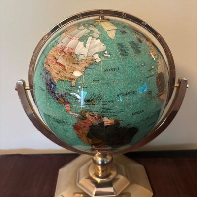 LOT 84: Gold Brass Tabletop World Globe w/Gemstone Inlay, World Globe w/ Inlay Gemstone Paperweight & Miksa Picture Frame
