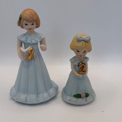 LOT 53: Humpty Dumpty Collectors Plate Enesco Growing Up Birth Girls, and 75th Anniversary Winnie The Pooh Book