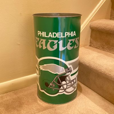 LOT 67: Philadelphia Sports Memorabilia - Vintage Eagles Construction Helmet, Metal Trash Can, Pair of Drinking Glasses, Flyers Plush and...