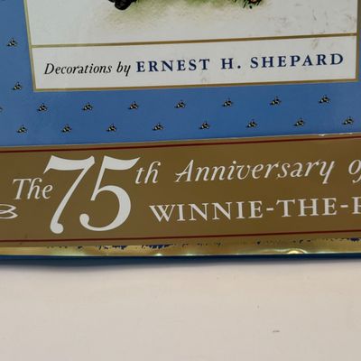LOT 53: Humpty Dumpty Collectors Plate Enesco Growing Up Birth Girls, and 75th Anniversary Winnie The Pooh Book
