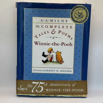 LOT 53: Humpty Dumpty Collectors Plate Enesco Growing Up Birth Girls, and 75th Anniversary Winnie The Pooh Book
