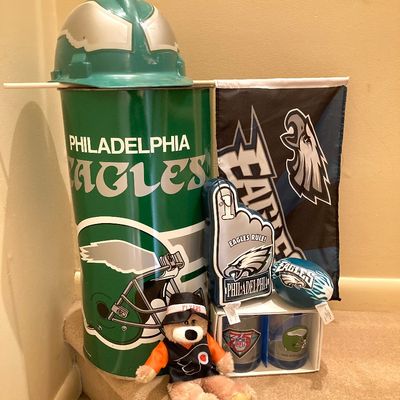LOT 67: Philadelphia Sports Memorabilia - Vintage Eagles Construction Helmet, Metal Trash Can, Pair of Drinking Glasses, Flyers Plush and...