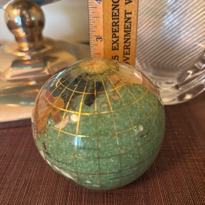 LOT 84: Gold Brass Tabletop World Globe w/Gemstone Inlay, World Globe w/ Inlay Gemstone Paperweight & Miksa Picture Frame