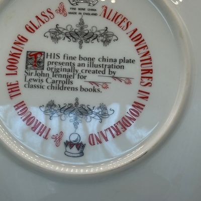 LOT 53: Humpty Dumpty Collectors Plate Enesco Growing Up Birth Girls, and 75th Anniversary Winnie The Pooh Book